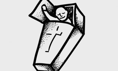 man in coffin