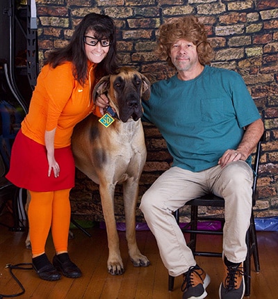 Angie and Joe Scavone dress up as Scooby Doo’s Velma and Shaggy for Halloween, with Voodoo in the title role.