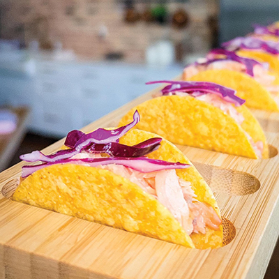 MINI TACOS Fresh-caught Atlantic salmon with organic red cabbage and goat milk slaw? Yes, please.