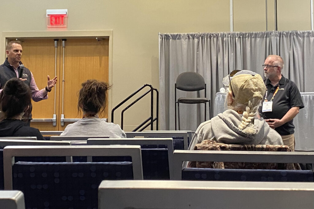 Dr. Micah Kohles and Dr. Cliff Faver presenting a session at GROOM'D 2026.